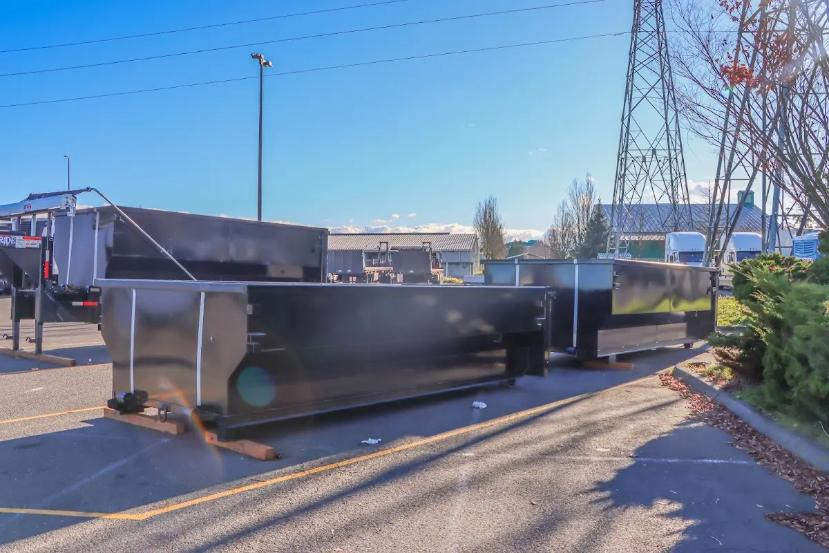 Roll-off dumpster ready for waste disposal at job site for Yard Waste Dumpster Rental in Gaithersburg